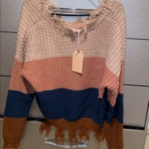 It’s a crop top new never used